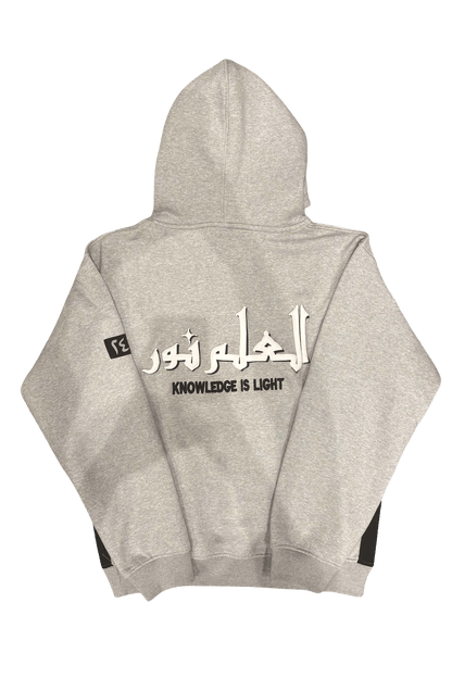 Gray hoodie with Arabic Calligraph on the back from Noor Apparel's debut drop Knowledge is Light.