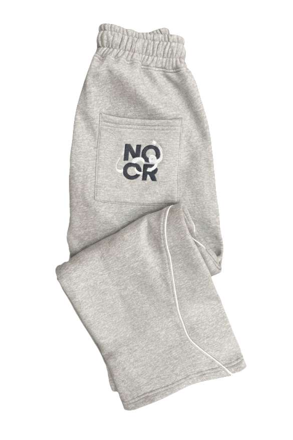 Gray sweatpants with the Noor Apparel logo from the Knowledge Is Light tracksuit at Noor Apparel. 