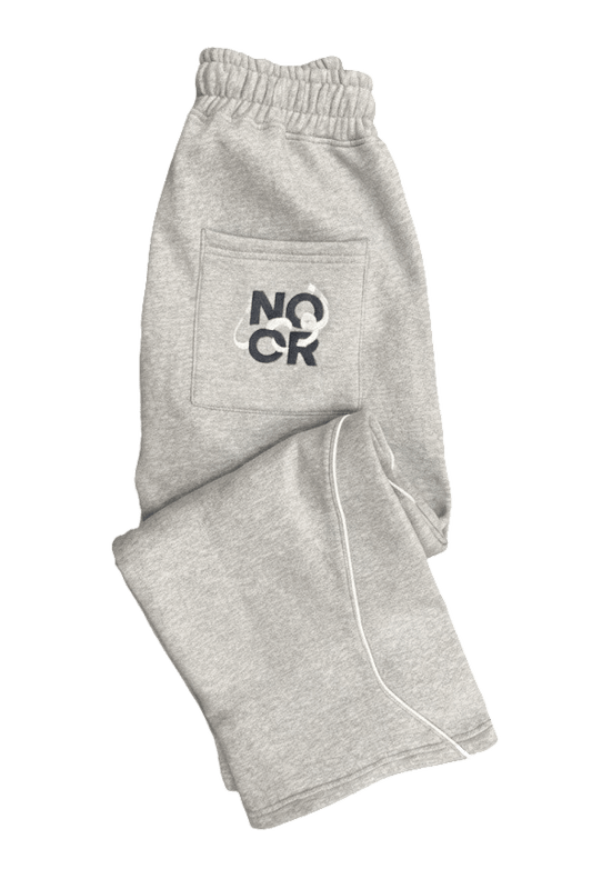 Gray sweatpants with the Noor Apparel logo from the Knowledge Is Light tracksuit at Noor Apparel. 